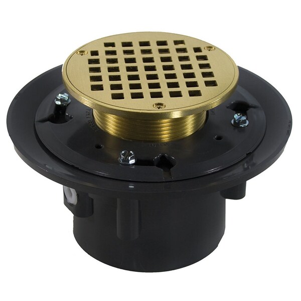 Jones Stephens 3in. x 4in. Heavy Duty PVC Drain Base with 3-1/2in. Metal Spud and 4in. Polished Brass Strainer D49151 - main